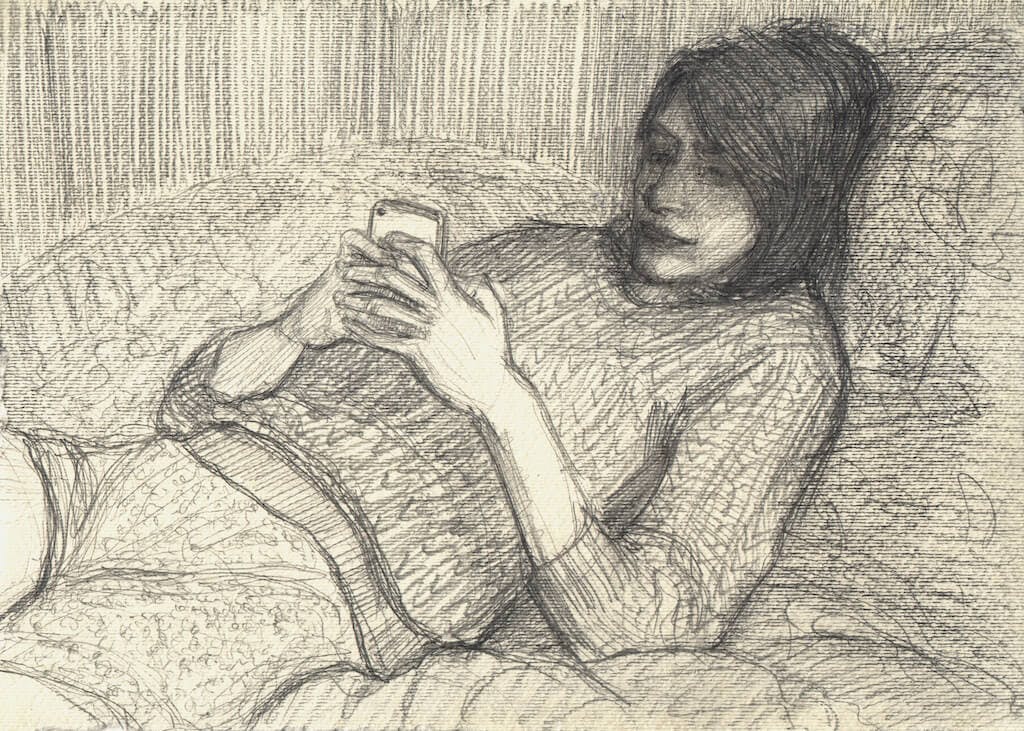 in bed on phone
